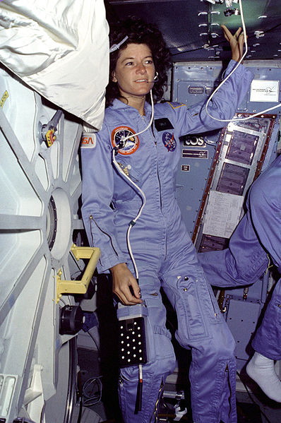 NASA photo of Mission Specialist Sally Ride floating alongside the middeck airlock hatch during the STS-7 mission aboard Space Shuttle Challenger.