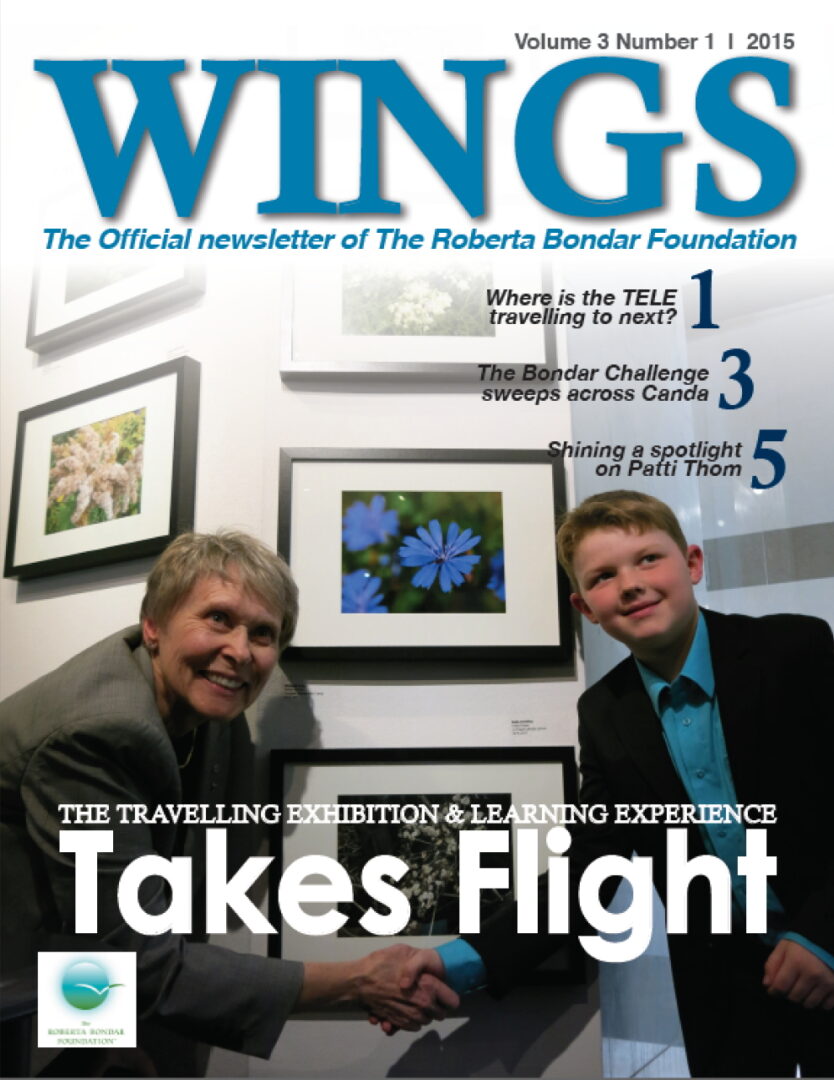 Cover of WINGS Volume 3 Number 5 showing Roberta Bondar shaking hands with a boy 