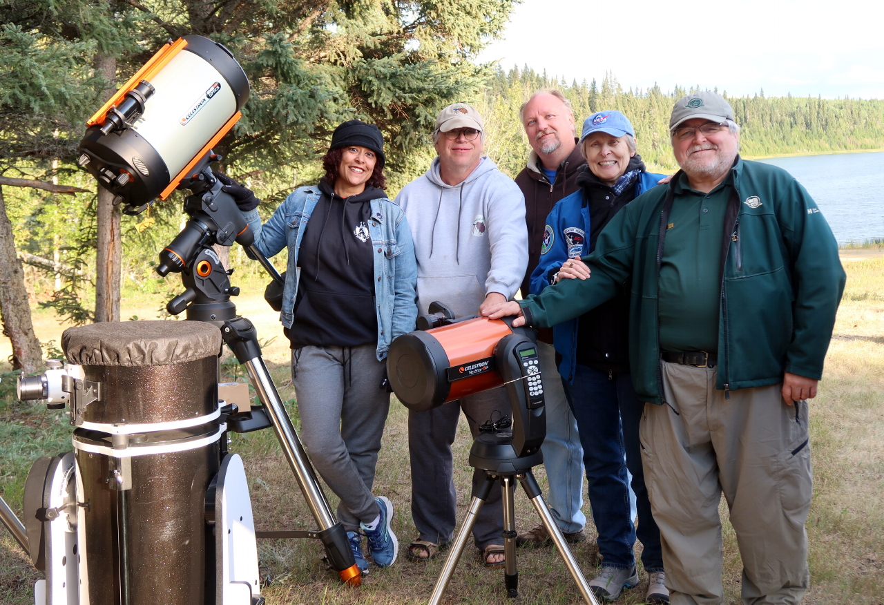 Nicole, Mike, Roland, Roberta, and Tim Gauthier with telescopes poised for the dark sky at Pine Lake, WBNP