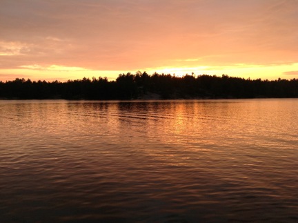 Image of a sunset over a lake
