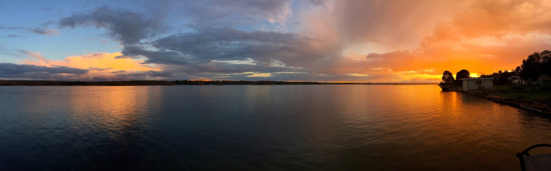 Panoramic image of sunset on a lake