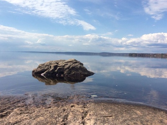 Image of rock in lake