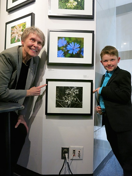 Dr Bondar with Blake and his image "Forest Flower" -- First Place Winner, 2014 Fall Semester School-Based Bondar Challenge