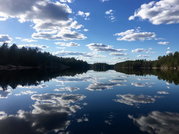 Image of the sky reflected on a lake