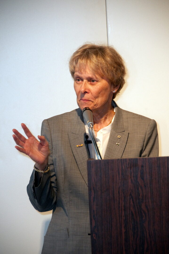 Image of Dr. Bondar at a podium