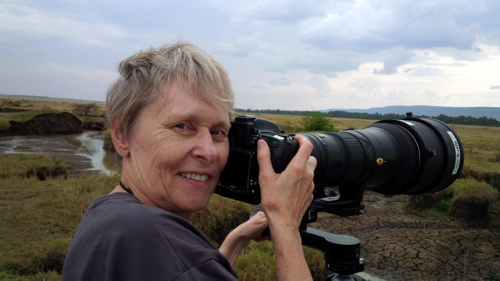 Dr. Roberta Bondar and trusty Nikon at work in Kenya’s Masai Mara.